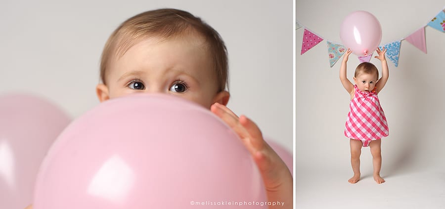1 year photos with banner and pink balloons