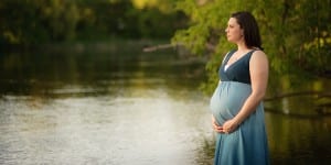 Maternity photo in a lake