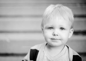 black and white photo of boy