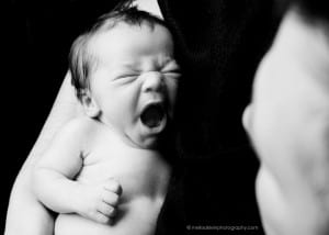 newborn baby big yawn