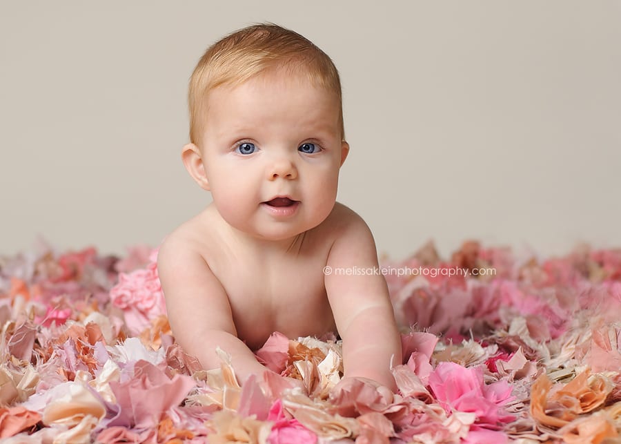 baby girl on pink shag rug