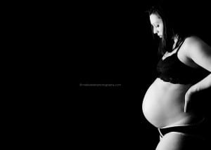 Black and white studio low key maternity photo