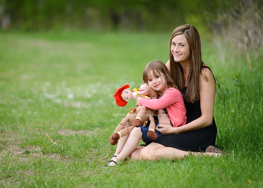 mom and daughter photo outdoors with Jessie doll