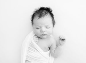 Black and white simple sleeping newborn photo