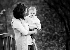 black and white photo of mom and baby