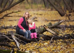 mom and daughter outdoors in the fall