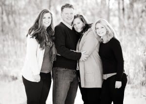 family photo outdoors in snow black and white