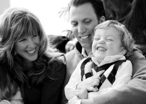 family laughing black and white