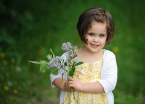 girl in yellow GAP dress with flowers