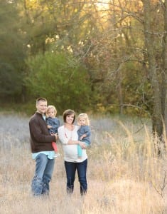 family photos in the morning in a field backlit