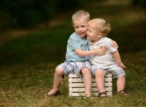 outdoor photo of brothers hugging