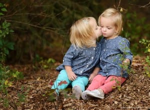 twin 2 year old girls outdoors