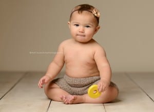 6 month baby photos in studio on bone seamless paper
