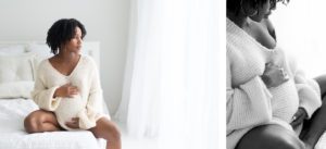 Minneapolis maternity photographer - pregnant woman sitting on bed with oversized sweater