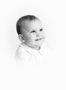 black and white vignette heirloom photo of one year old baby boy