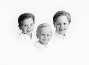 black and white heirloom photo collage of three brothers