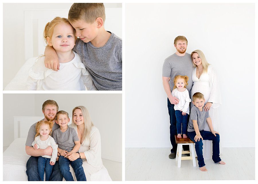 Maternity photos in white natural light studio with a growing family of four