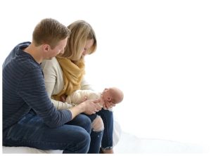 backlit newborn photos with parents