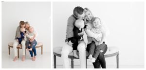 candid family photos on a bench in minimalist studio in Lino Lakes