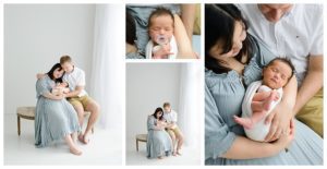 studio newborn photography with mom and dad on bench holding baby girl