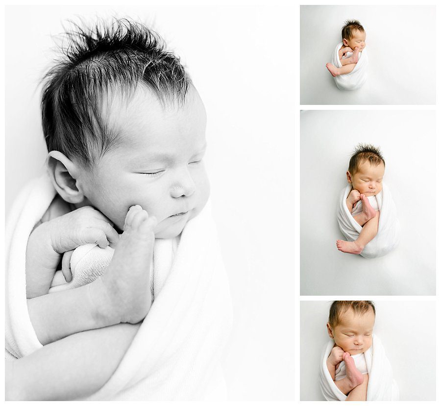breech baby swaddled on white fabric for a studio newborn session