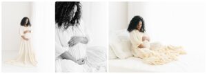 mom in white gown sitting on bed for pregnancy photos in natural light photography studio.