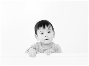 black and white photo of one year old baby boy