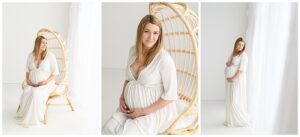 Pregnant mom in long with dress next to floor to ceiling window with white sheers