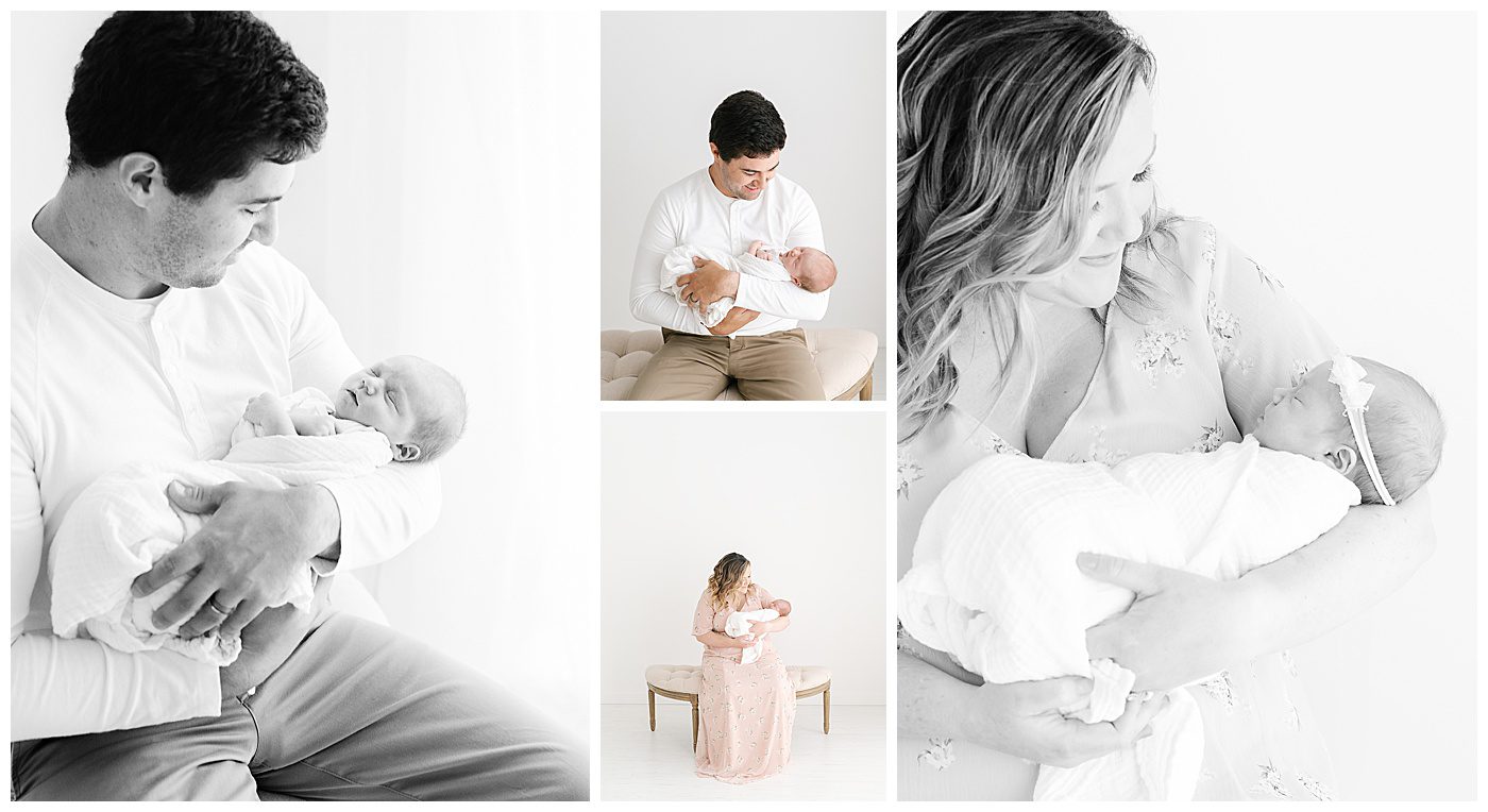 newborn photos of parents holding baby girl in Blaine photographer studio
