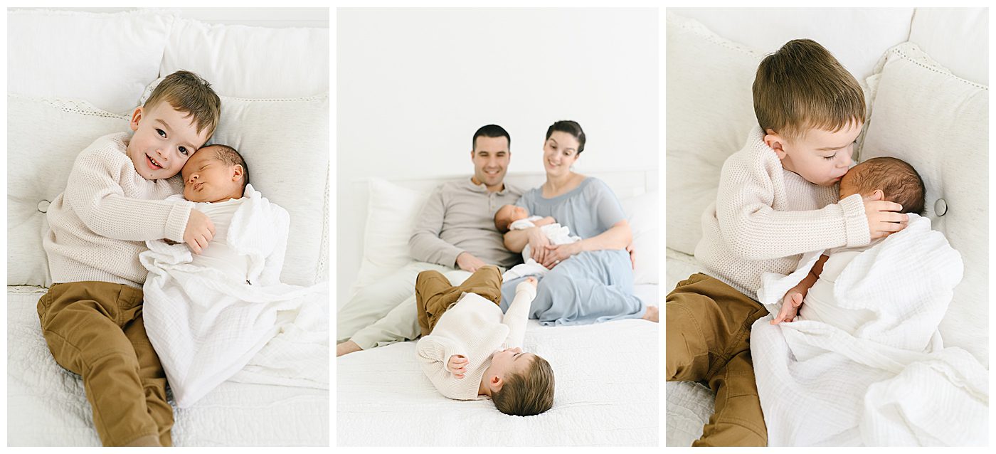 photos of toddler brother and newborn baby boy with natural light photography studio