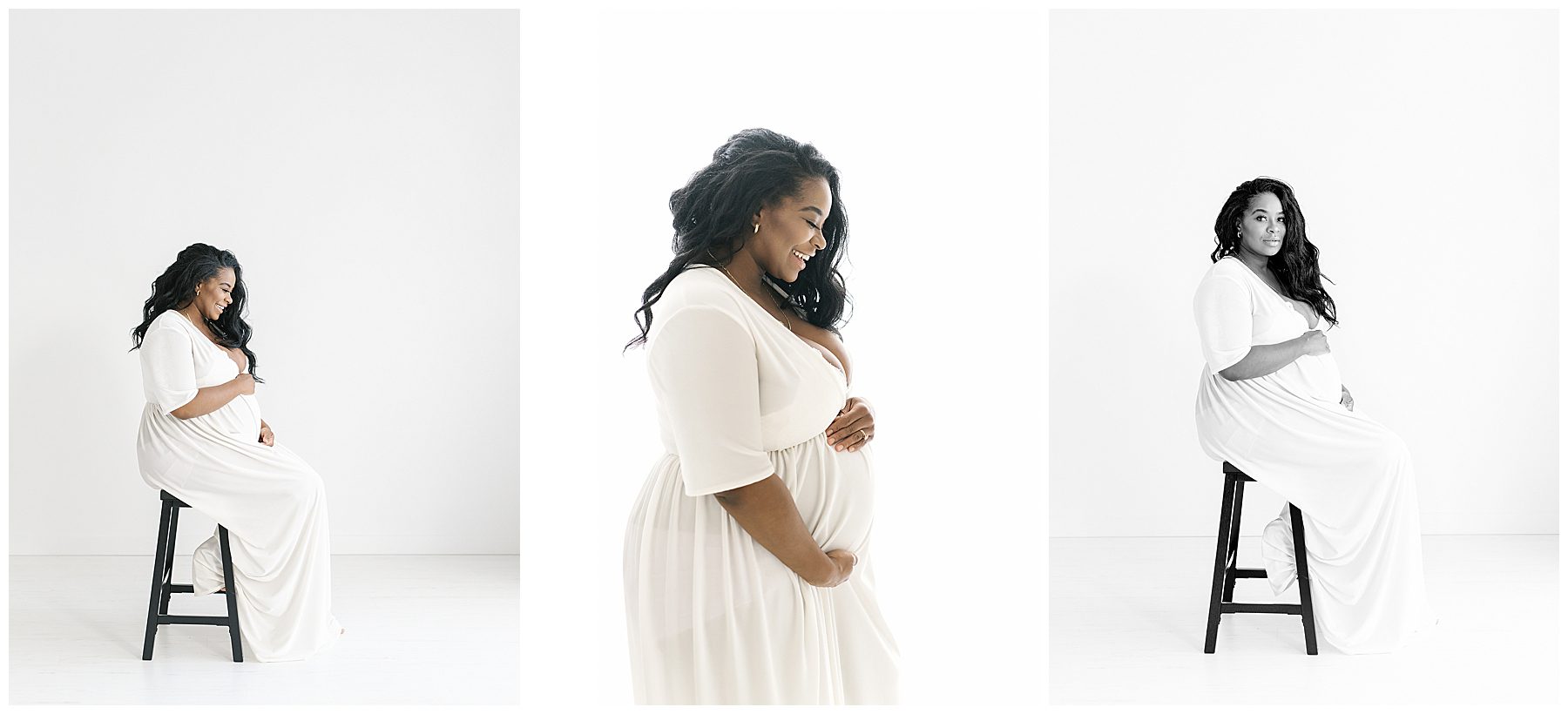 maternity photos of gorgeous black woman wearing white gown against a white backdrop