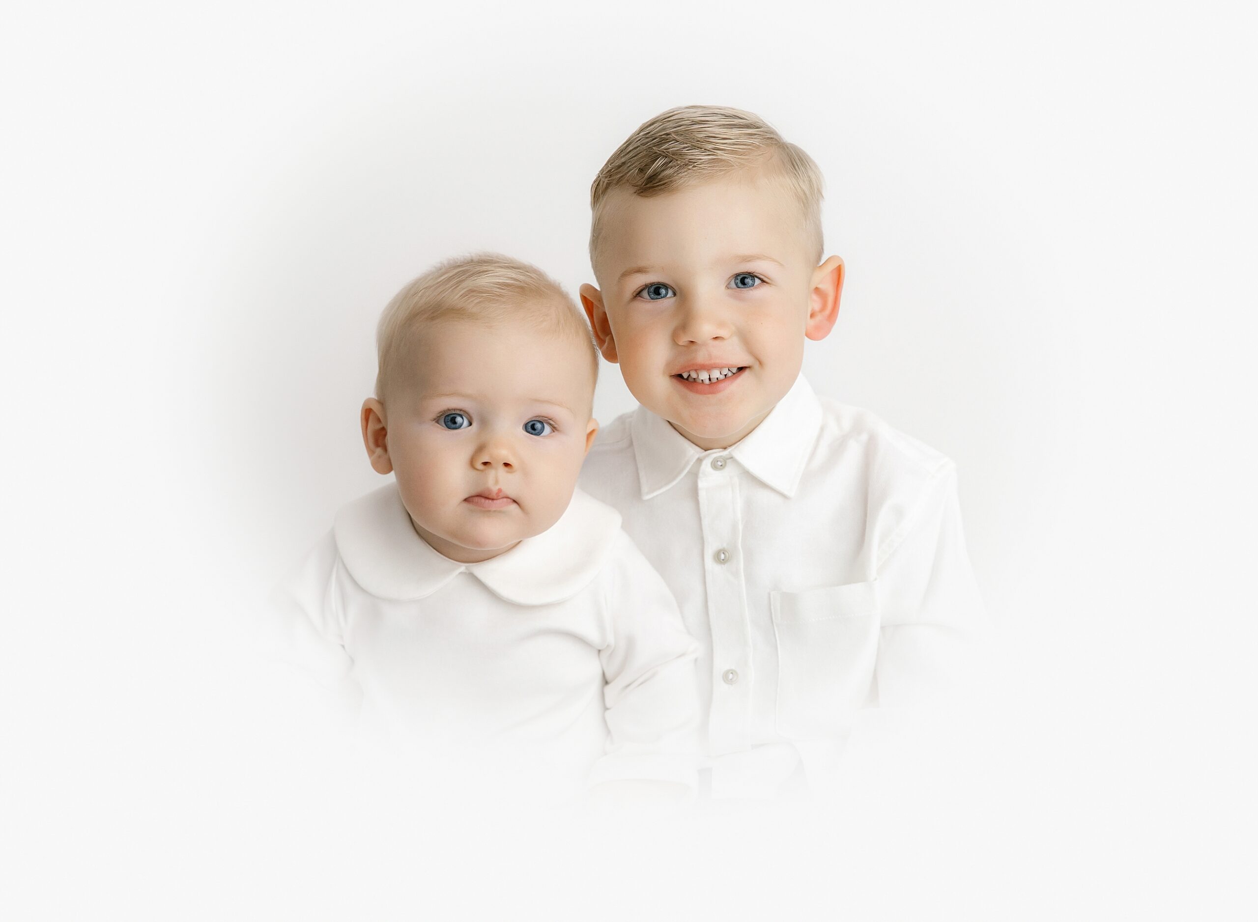 children's classic vintage heirloom portrait of two brothers with white vignette in Minneapolis MN photography studio