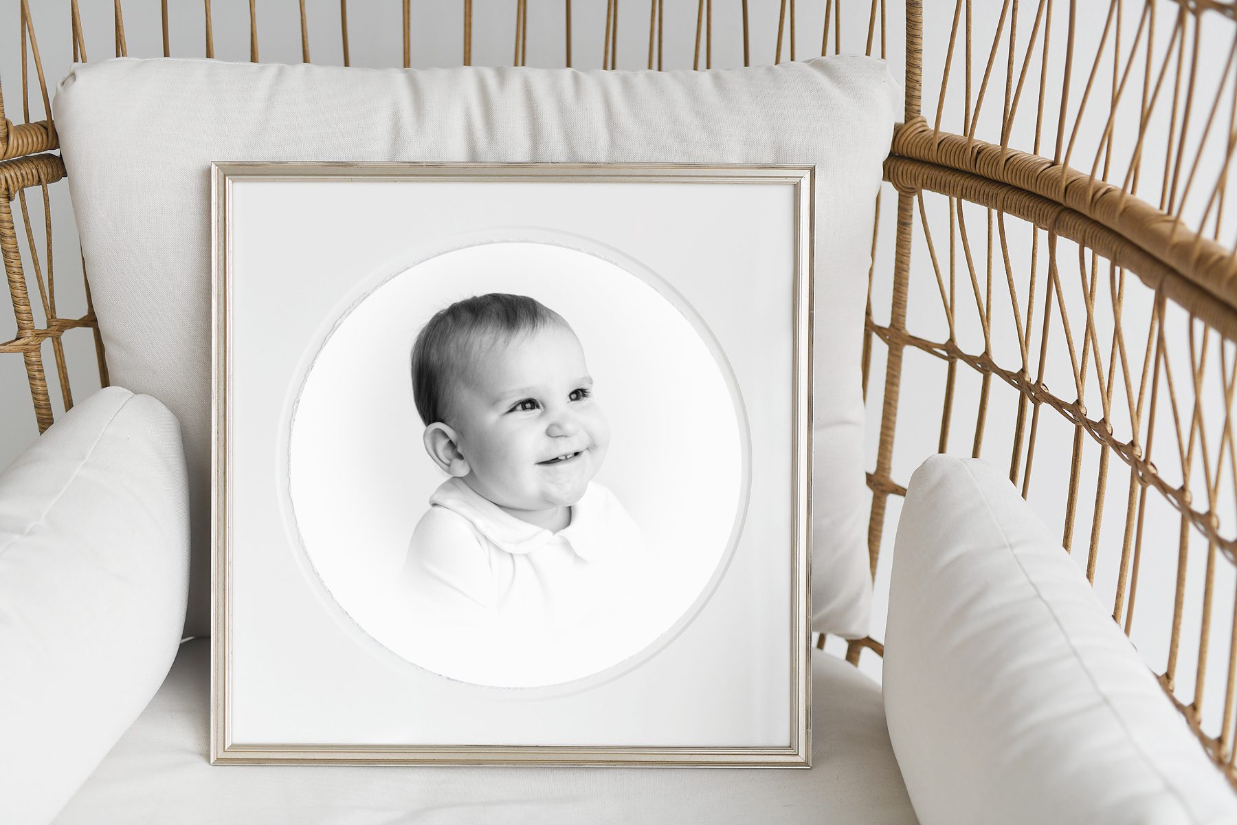 framed heirloom black and white portrait of 12 month old baby boy looking off in the distance